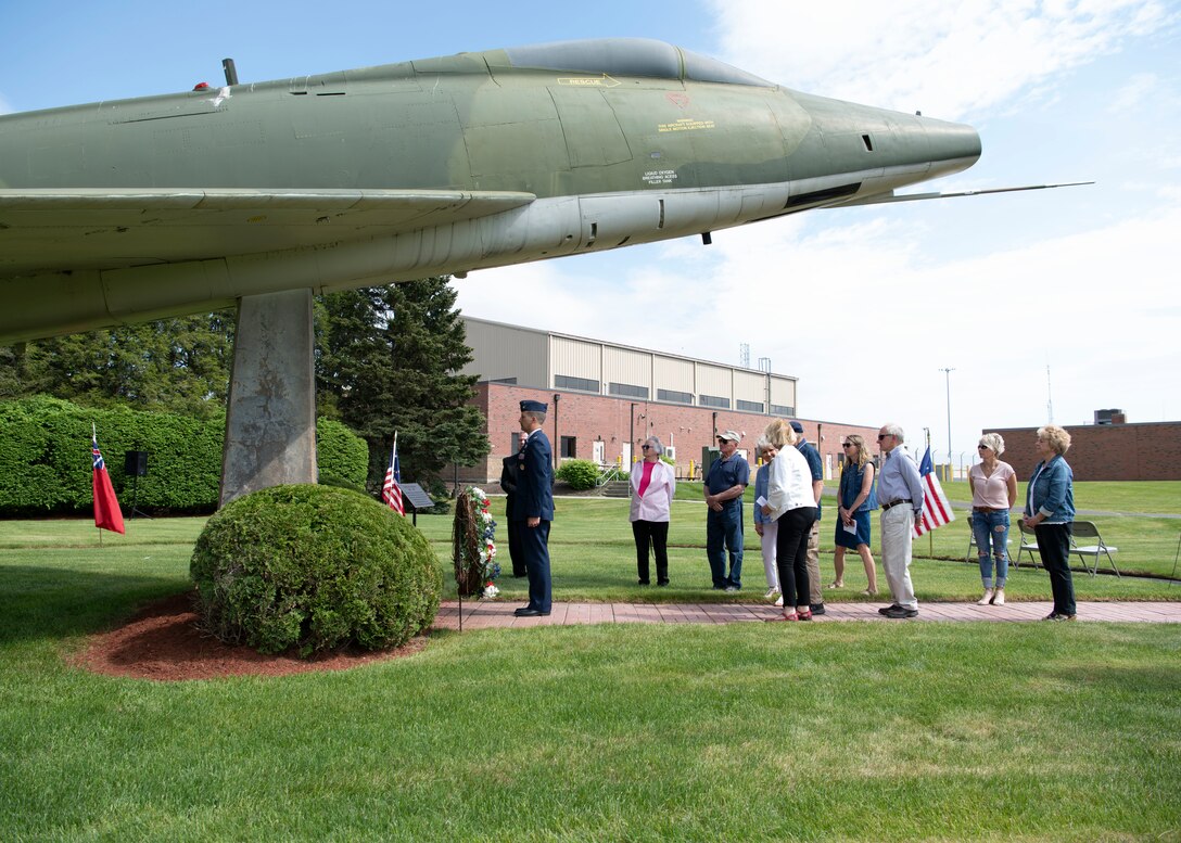 Barnestomers honor the 13 Airmen fallen in flight from the 104th Fighter Wing during the F-100 memorial rededication ceremony, May 20, 2022, at Barnes Air National Guard Base, Massachusetts. The F-100 monument was originally dedicated on May 17, 1987 by the 104FW Chief Master Sergeant’s Council. It continues to serve as a reminder of fallen Airmen’s impact on the unit.(U.S. Air National Guard photo by Staff Sgt. Hanna Smith)