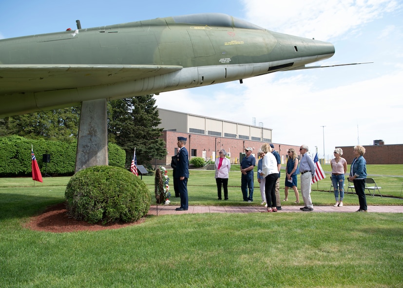 Barnestomers honor the 13 Airmen fallen in flight from the 104th Fighter Wing during the F-100 memorial rededication ceremony, May 20, 2022, at Barnes Air National Guard Base, Massachusetts. The F-100 monument was originally dedicated on May 17, 1987 by the 104FW Chief Master Sergeant’s Council. It continues to serve as a reminder of fallen Airmen’s impact on the unit.(U.S. Air National Guard photo by Staff Sgt. Hanna Smith)