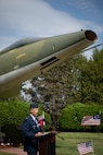 Barnestomers honor the 13 Airmen fallen in flight from the 104th Fighter Wing during the F-100 memorial rededication ceremony, May 20, 2022, at Barnes Air National Guard Base, Massachusetts. The F-100 monument was originally dedicated on May 17, 1987 by the 104FW Chief Master Sergeant’s Council. It continues to serve as a reminder of fallen Airmen’s impact on the unit.(U.S. Air National Guard photo by Staff Sgt. Hanna Smith)
