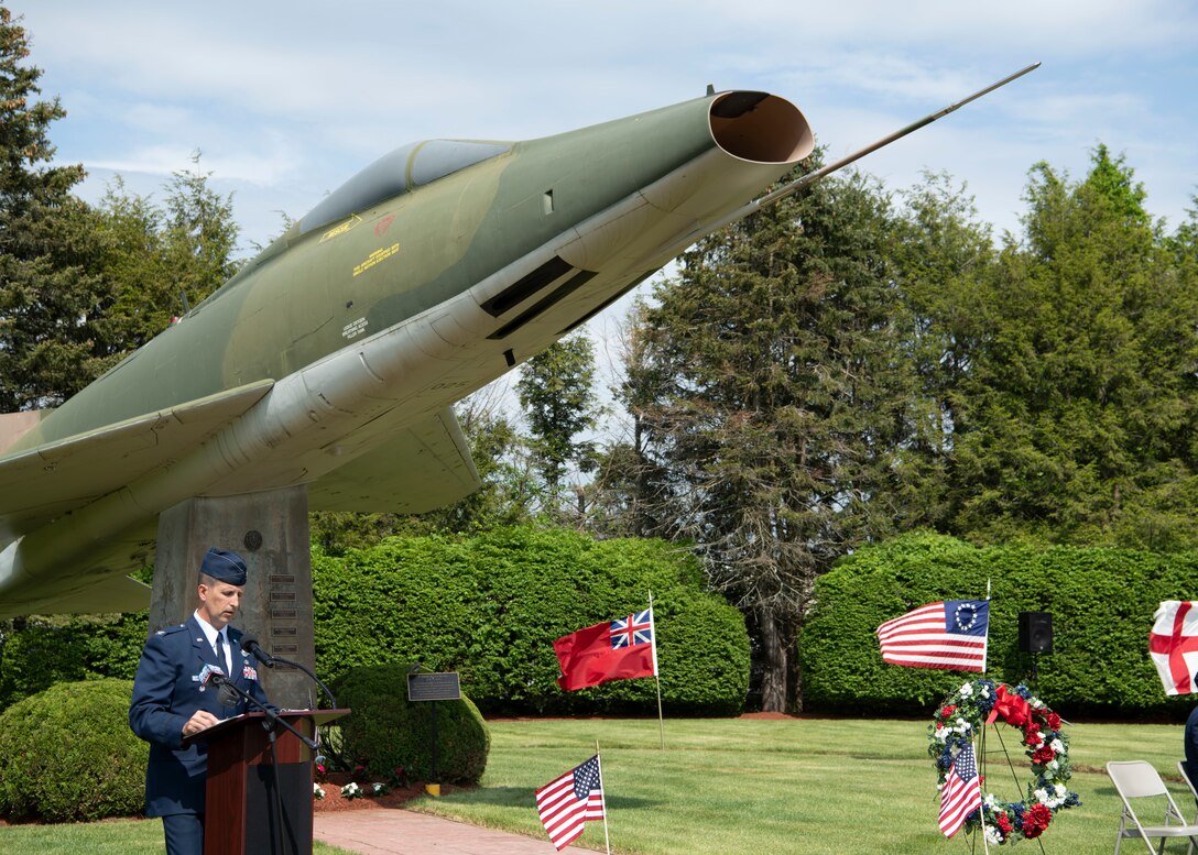 Barnestomers honor the 13 Airmen fallen in flight from the 104th Fighter Wing during the F-100 memorial rededication ceremony, May 20, 2022, at Barnes Air National Guard Base, Massachusetts. The F-100 monument was originally dedicated on May 17, 1987 by the 104FW Chief Master Sergeant’s Council. It continues to serve as a reminder of fallen Airmen’s impact on the unit.(U.S. Air National Guard photo by Staff Sgt. Hanna Smith)