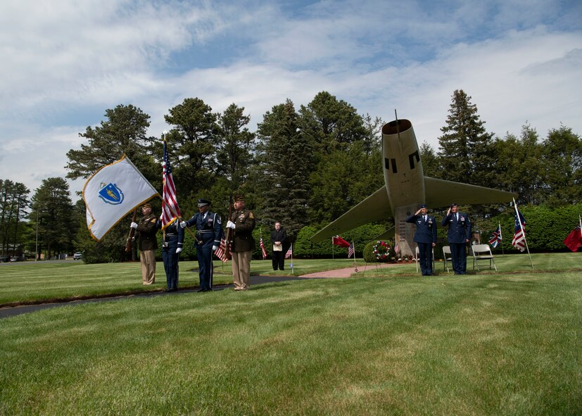 Barnestomers honor the 13 Airmen fallen in flight from the 104th Fighter Wing during the F-100 memorial rededication ceremony, May 20, 2022, at Barnes Air National Guard Base, Massachusetts. The F-100 monument was originally dedicated on May 17, 1987 by the 104FW Chief Master Sergeant’s Council. It continues to serve as a reminder of fallen Airmen’s impact on the unit.(U.S. Air National Guard photo by Staff Sgt. Hanna Smith)