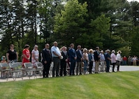 Barnestomers honor the 13 Airmen fallen in flight from the 104th Fighter Wing during the F-100 memorial rededication ceremony, May 20, 2022, at Barnes Air National Guard Base, Massachusetts. The F-100 monument was originally dedicated on May 17, 1987 by the 104FW Chief Master Sergeant’s Council. It continues to serve as a reminder of fallen Airmen’s impact on the unit.(U.S. Air National Guard photo by Staff Sgt. Hanna Smith)