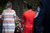 Barnestomers honor the 13 Airmen fallen in flight from the 104th Fighter Wing during the F-100 memorial rededication ceremony, May 20, 2022, at Barnes Air National Guard Base, Massachusetts. The F-100 monument was originally dedicated on May 17, 1987 by the 104FW Chief Master Sergeant’s Council. It continues to serve as a reminder of fallen Airmen’s impact on the unit.(U.S. Air National Guard photo by Staff Sgt. Hanna Smith)
