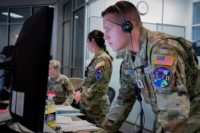 The 1st Range Operations Squadron range operations commanders manage operations inside the Morrell Operations Center in support of the Orbital Flight Test 2 launch, May 19, 2022, Cape Canaveral Space Force Station, Fla. The MOC supports every space launch from CCSFS and Kennedy Space Center. (U.S. Space Force photo by Senior Airman Dakota Raub)