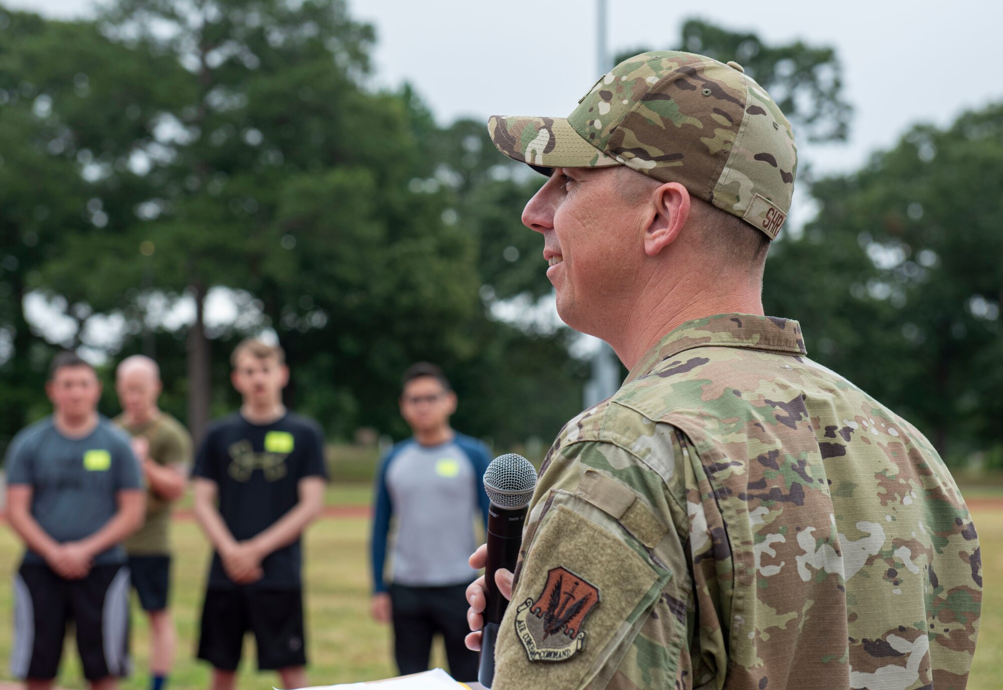 Capt. David Shrader, 4th Fighter Wing chaplain, speaks to participants before a Murph Challenge at Seymour Johnson Air Force Base, North Carolina, May 26, 2022. Shrader challenged participants to achieve above their expectations during the competition. (U.S. Air Force photo by Airman 1st Class Sabrina Fuller)