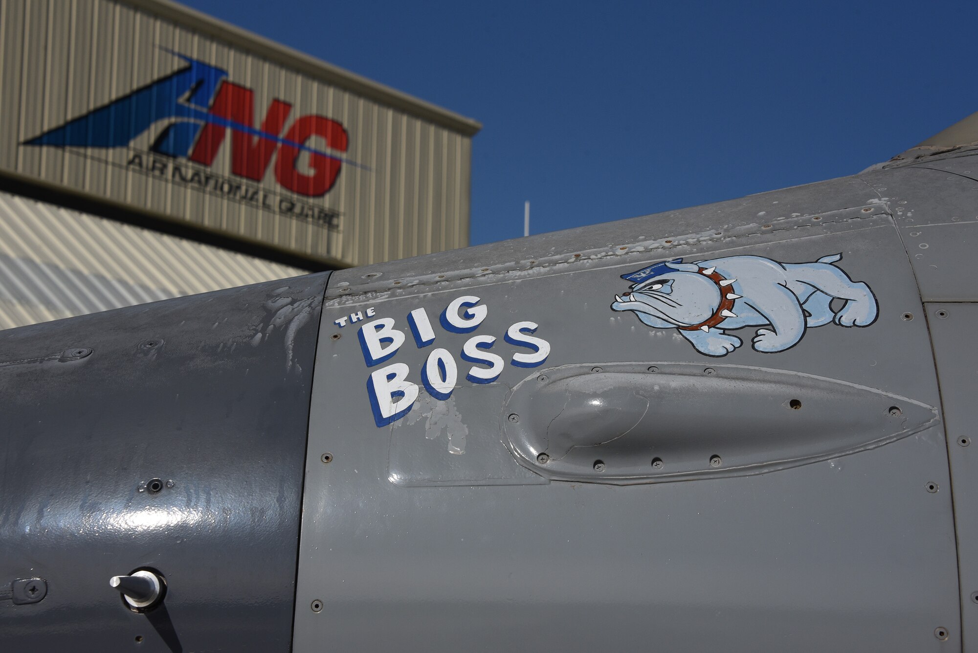 A U.S. Air Force F-16 is removed from static display and moved to paint facility.