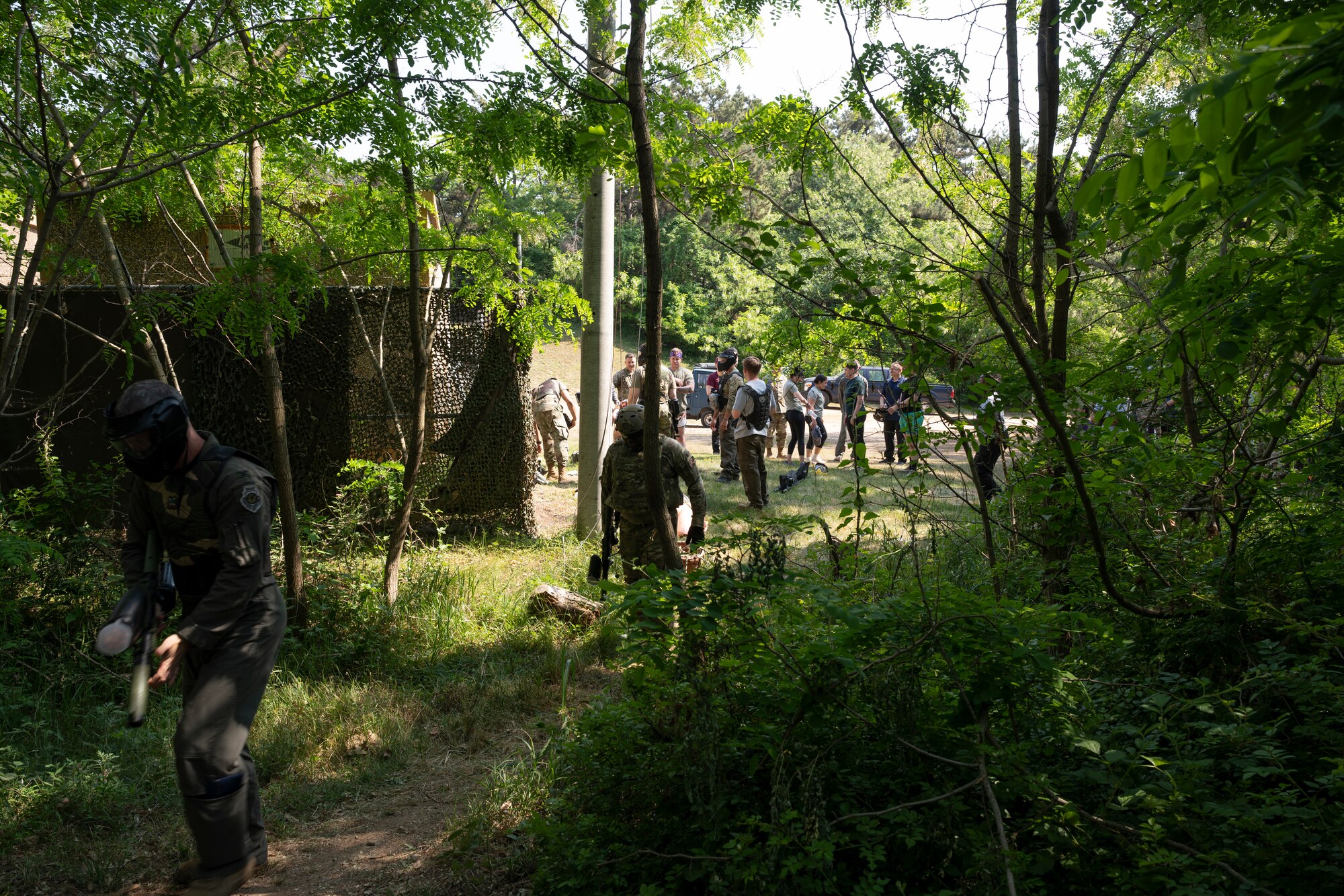 A group of Airmen prepares for a paintball exercise.