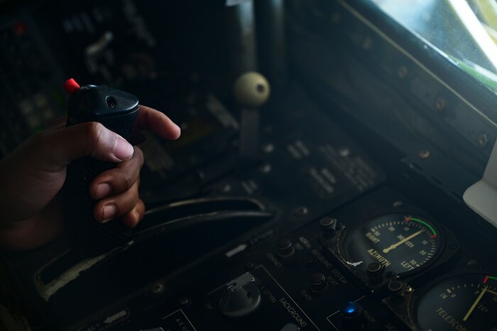 U.S. Air Force Airman 1st Class Amante Allen, a KC-135 Stratotanker aerial refueling specialist assigned to the 50th Expeditionary Air Refueling Squadron, refuels an aircraft during exercise Accurate Test 22 within the U.S. Central Command area of responsibility, May 15, 2022. The U.S. military and Royal Air Force of Oman routinely conduct integrated training in order to promote military cooperation between nations. (U.S. Air Force photo by Staff Sgt. Ashley Sokolov)