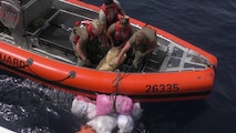 GULF OF OMAN (May 31, 2022) Personnel from U.S. Coast Guard fast response cutter USCGC Glen Harris (WPC 1144) recover bags of illegal narcotics discarded by a fishing vessel interdicted in the Gulf of Oman, May 31.