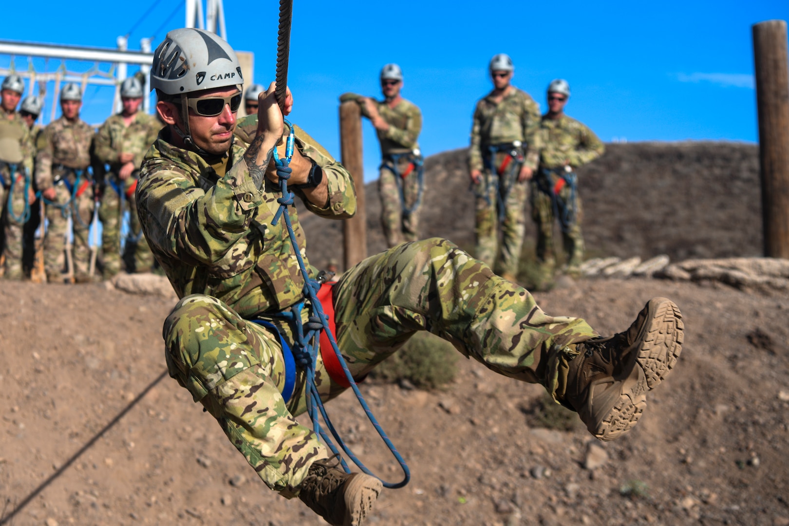 U.S. Air Force Tech. Sgt. Roy Wollgast, an 82nd Expeditionary Rescue Squadron survival, evasion, resistance and escape specialist, completes an obstacle during the French Desert Commando Course at Arta Range, Djibouti, April 26, 2022. Since 2015, the French Forces stationed in Djibouti have invited U.S. service members with the Combined Joint Task Force – Horn of Africa and Camp Lemonnier to participate in the course.