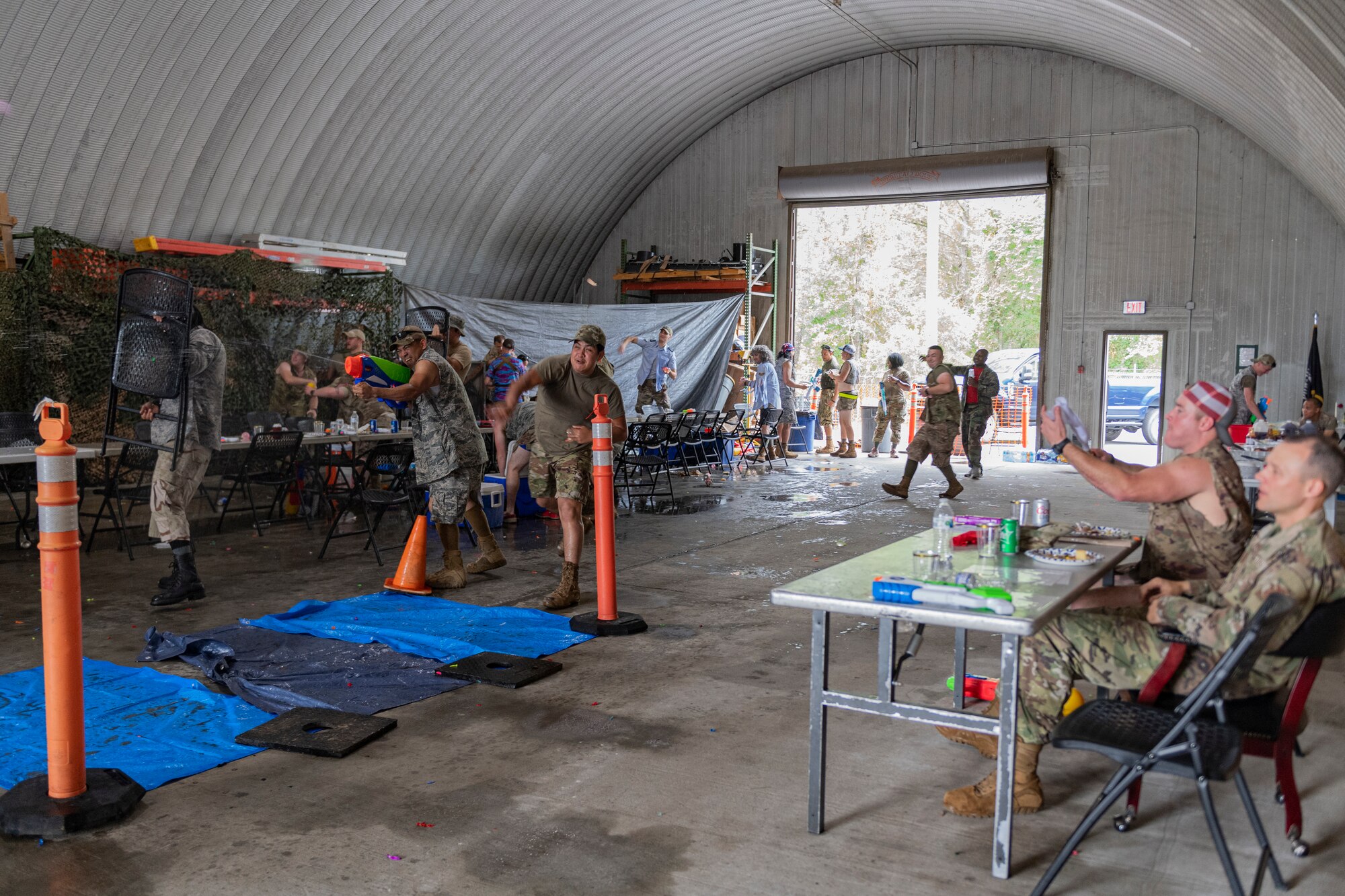 Photo of Airmen participating in a water war