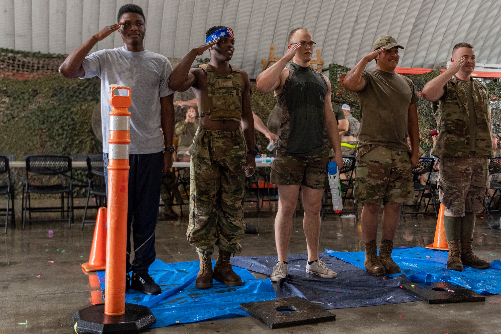 Photo of Airmen saluting a combat dining-in president