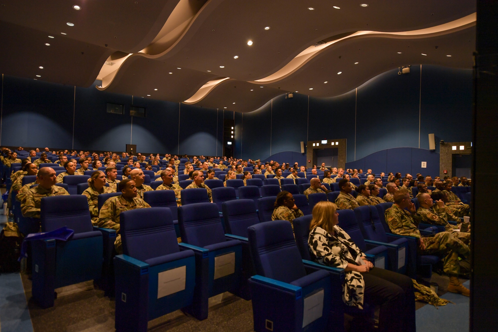 More than 500 members from the Kaiserslautern Military Community and geographically separated units gather, both in person and virtually, for an Enlisted Summit at the Hercules Theater at Ramstein Air Base, Germany, May 24, 2022.