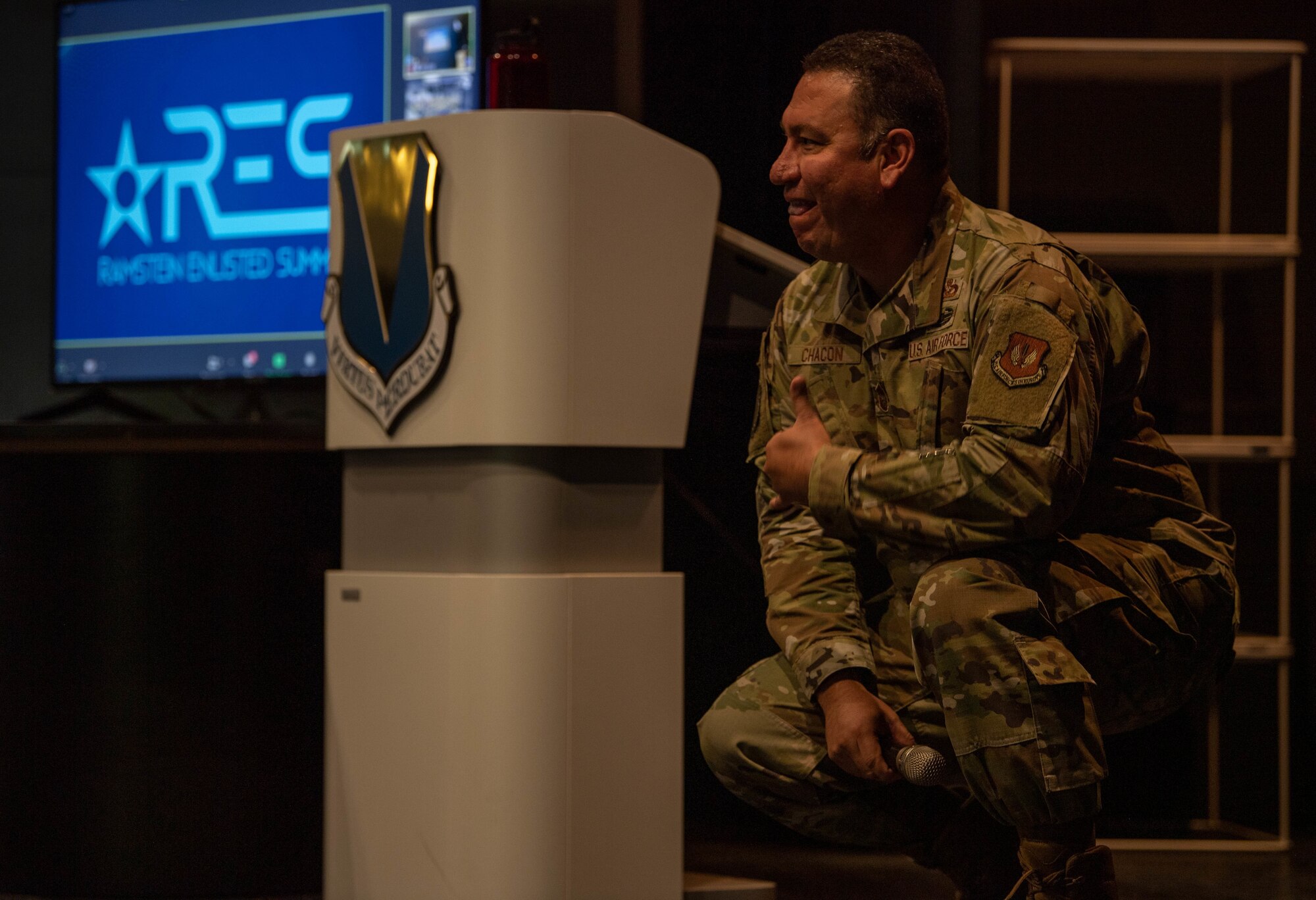U.S. Air Force Chief Master Sgt. John Chacon 86th Operations Group superintendent conducted an open discussion at an Enlisted Summit at the Hercules Theater at Ramstein Air Base, Germany, May 24, 2022.