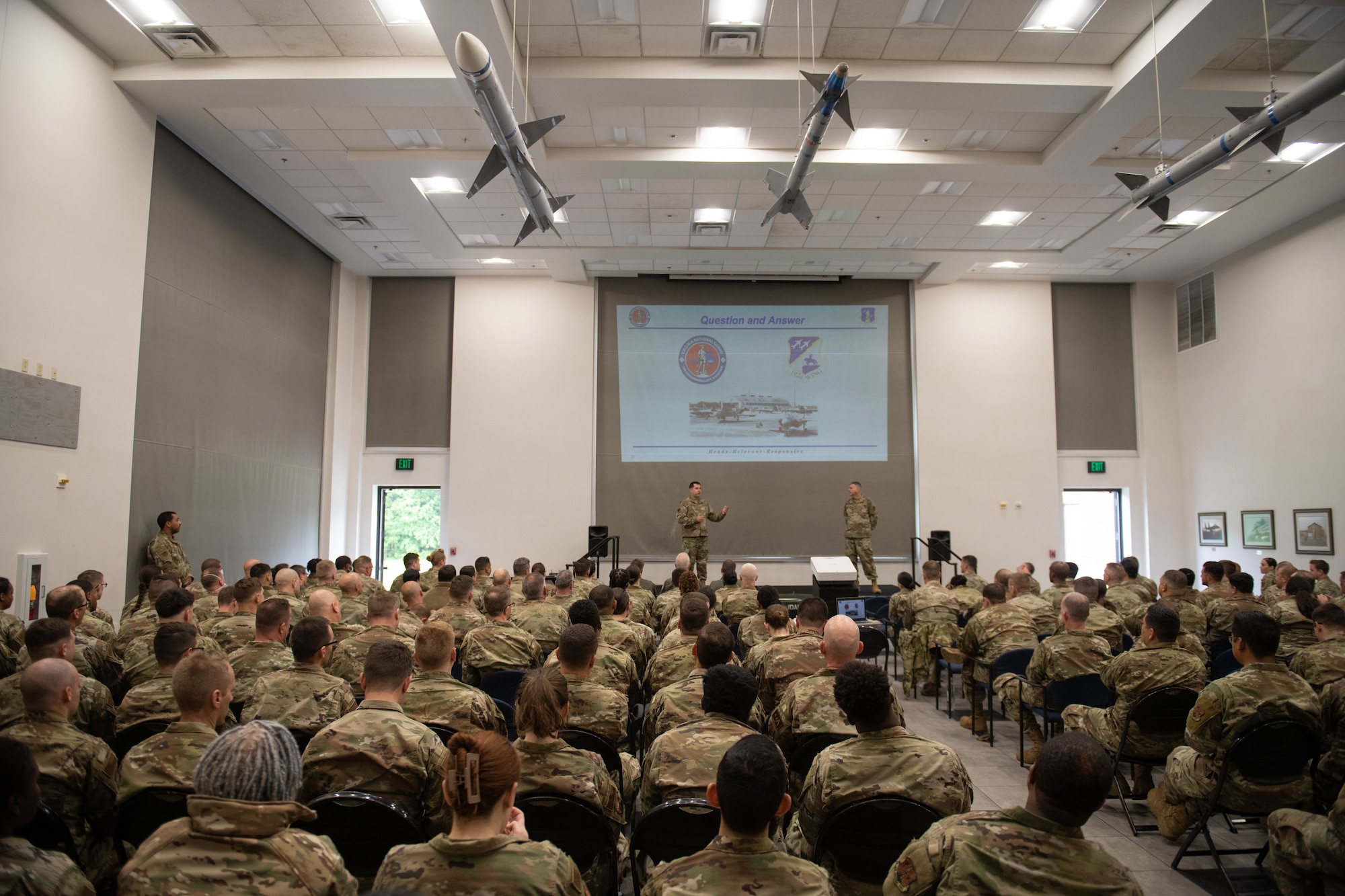 Col. Christopher G. Batterton, 192nd Wing commander, speaks to a group of Airmen.