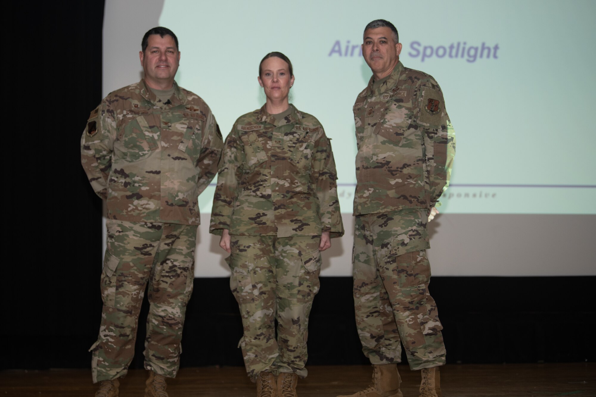 From left, Col. Christopher G. Batterton, 192nd Wing commander, Staff Sgt. Amanda Abendschoen, 192nd Support Squadron, and Chief Master Sgt. Richard Roberts, 192nd Wing command chief pose for a photo.