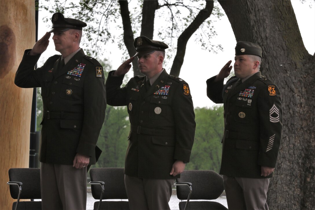 416th TEC top enlisted advisor renders first salute to newly commissioned son