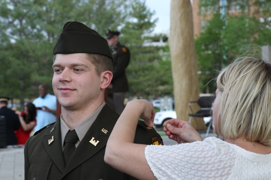 416th TEC top enlisted advisor renders first salute to newly commissioned son