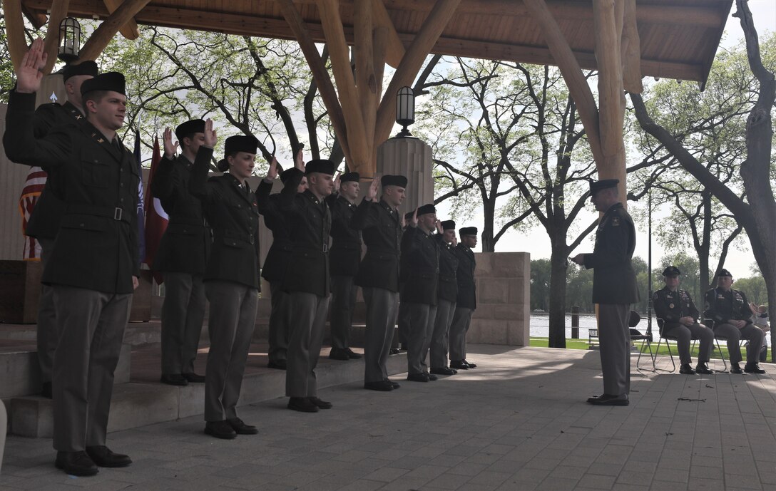 416th TEC top enlisted advisor renders first salute to newly commissioned son