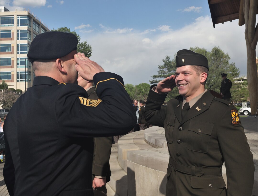 416th TEC top enlisted advisor renders first salute to newly commissioned son