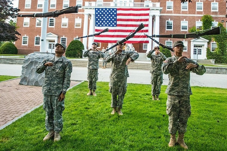 Photo of the Norwich University Drill Team performing complex drills with the M-14 rifle.
