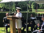 Defense Logistics Agency Land and Maritime and Defense Supply Center Columbus Commander U.S. Navy Rear Adm. Kristen Fabry spoke to a crowd of more than 100 attendees in Bexley, Ohio at the community’s World War II memorial, May 31.