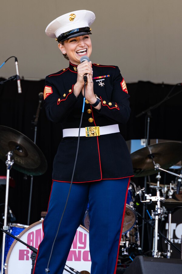 U.S. Marine Corps Sgt. Dana Reminsky, the vocalist of the Marine Corps Recruit Depot Parris Island Band, sings the National Anthem live during the Patriotic Festival at Norfolk Waterfront Norfolk, Virginia, May 29, 2022. The Patriotic Festival was held during Memorial Day weekend to honor the service men and women who paid the ultimate sacrifice in the line of duty. (U.S. Marine Corps photo by Sgt. Alexa M. Hernandez)
