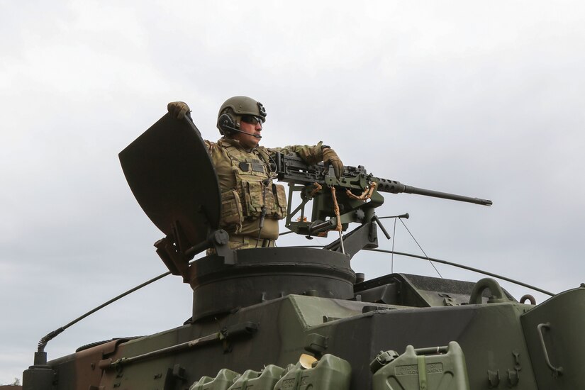 Soldiers with the 1st Battalion, 109th Artillery Regiment, 55th Maneuver Enhancement Brigade, 28th Infantry Division, Pennsylvania Army National Guard, move from cantonment into the field May 16, 2022, in Pabrade, Lithuania, to conduct live-fire artillery exercises with the M109A6 Paladin. The Soldiers are deployed to Lithuania in support of Defender Europe 22 and NATO exercise Flaming Thunder.