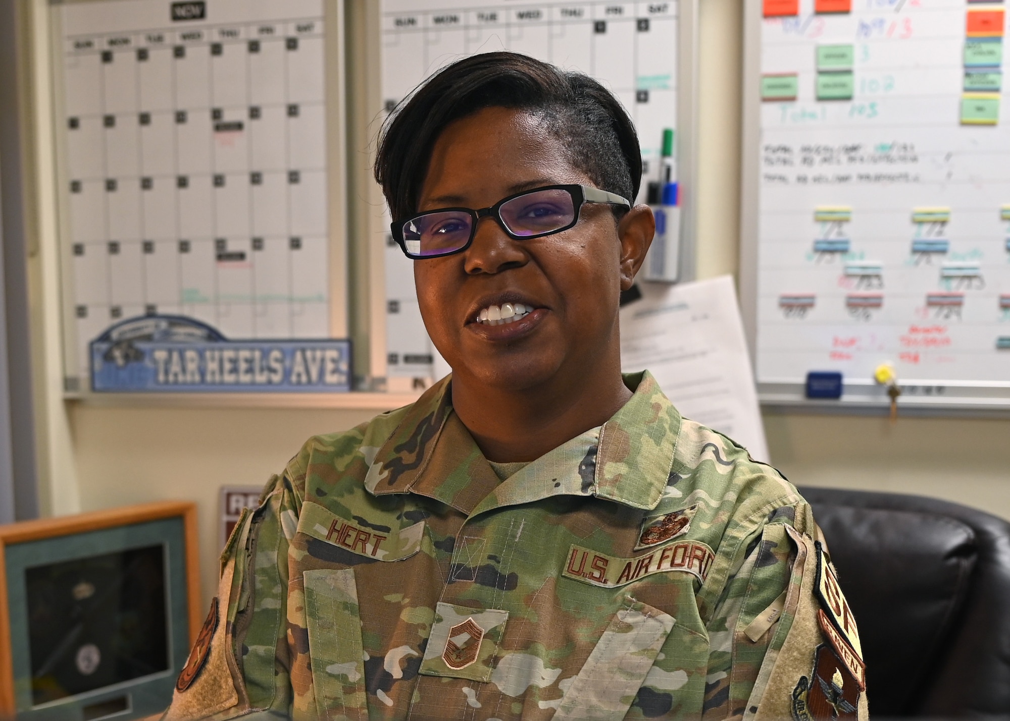 U.S. Air Force Chief Master Sgt. Chasity Hert, 17th Security Forces Squadron senior enlisted leader, poses in her office at Goodfellow Air Force Base, Texas, May 31, 2022. Hert served in the Air Force for 23 years and advocates for an open-minded military. (U.S. Air Force photo by Senior Airman Ethan Sherwood)