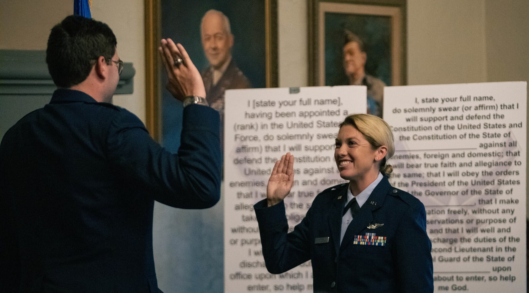 Grace Tinkey takes the oath of office June 2, 2022, on Maxwell Air Force Base, Alabama, as a newly commissioned second lieutenant. Tinkey commissioned through Air Force Officer Training School, attending the school following her selection in 2021 for the Senior Leader Enlisted Commissioning Program. The former enlisted C-17 loadmaster was also selected for the Euro-NATO Joint Jet Pilot Training Program. Her dream of becoming an officer and pilot were realized following personal tragedies that delayed her plans for nearly a decade. (U.S. Air Force Photo by Airman 1st Class Cody Gandy)