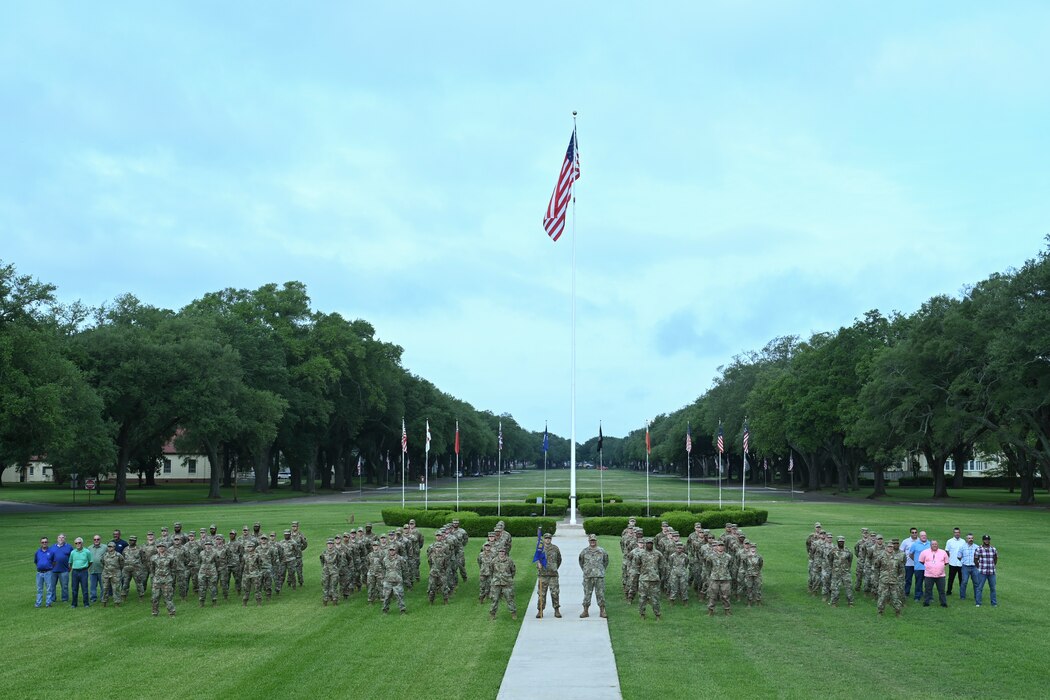 The 26th Operational Weather Squadron poses for a photo at Barksdale Air Force Base, Louisiana June 1, 2022.