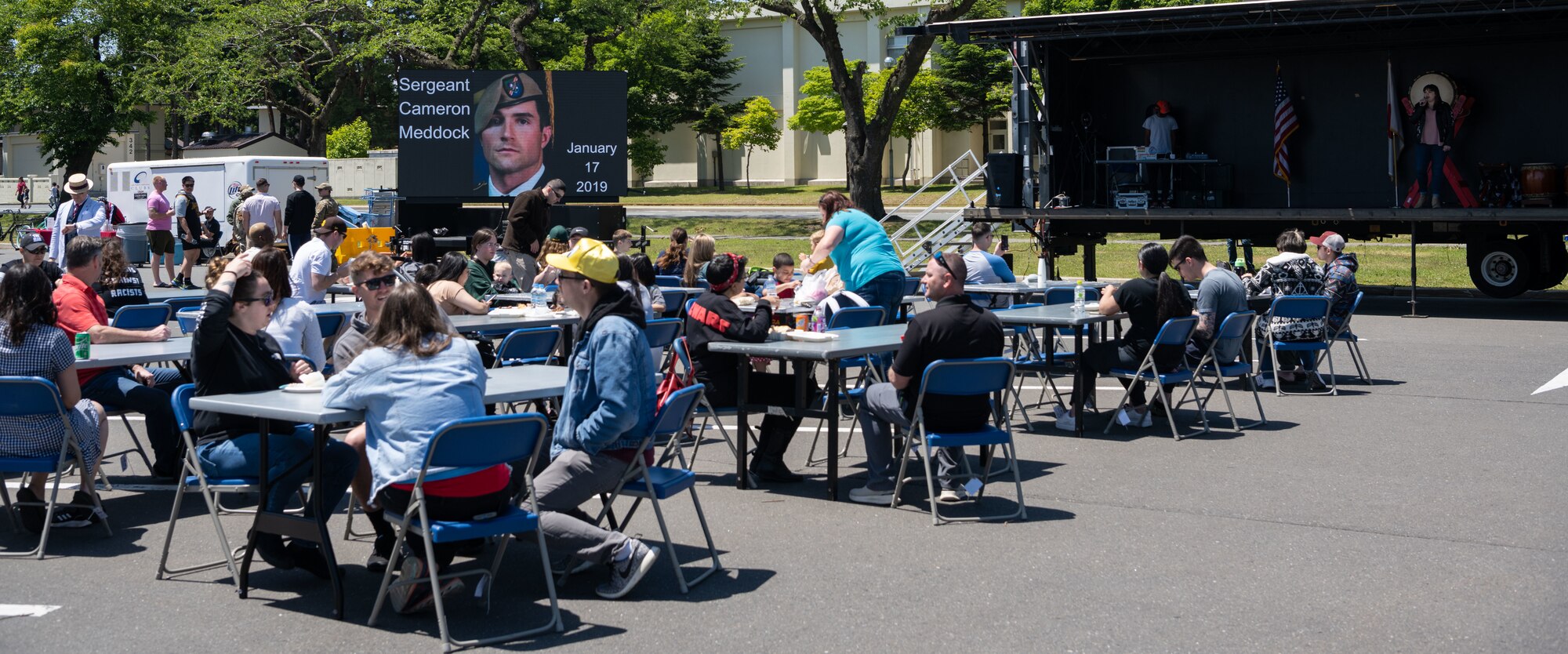Team Misawa members listen to music at the designated dining place.