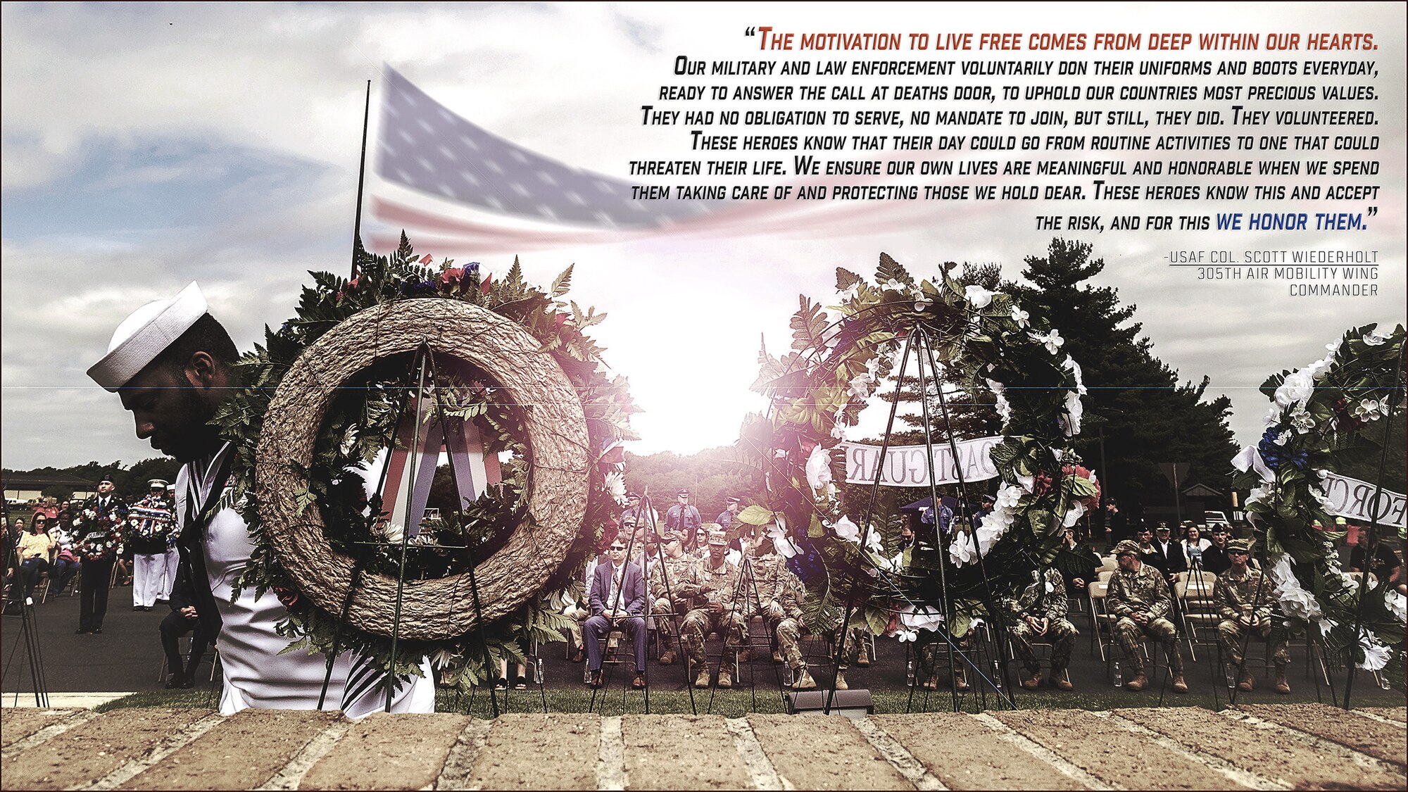 A sailor finishes placing a wreath display during the annual Parade of Wreaths ceremony on Joint Base McGuire-Dix-Lakehurst, N.J., May 26, 2022.  The event honors service members and police personnel who have given their lives in the line of duty. The installation and the Thomas B. McGuire Jr. Foundation conducted the first of what became the Parade of Wreaths in 1983, and have held it annually since, to commemorate Memorial Day. (U.S. Air Force photo-illustration by Tech. Sgt. Austin Knox)