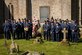 group photo in front of memorial