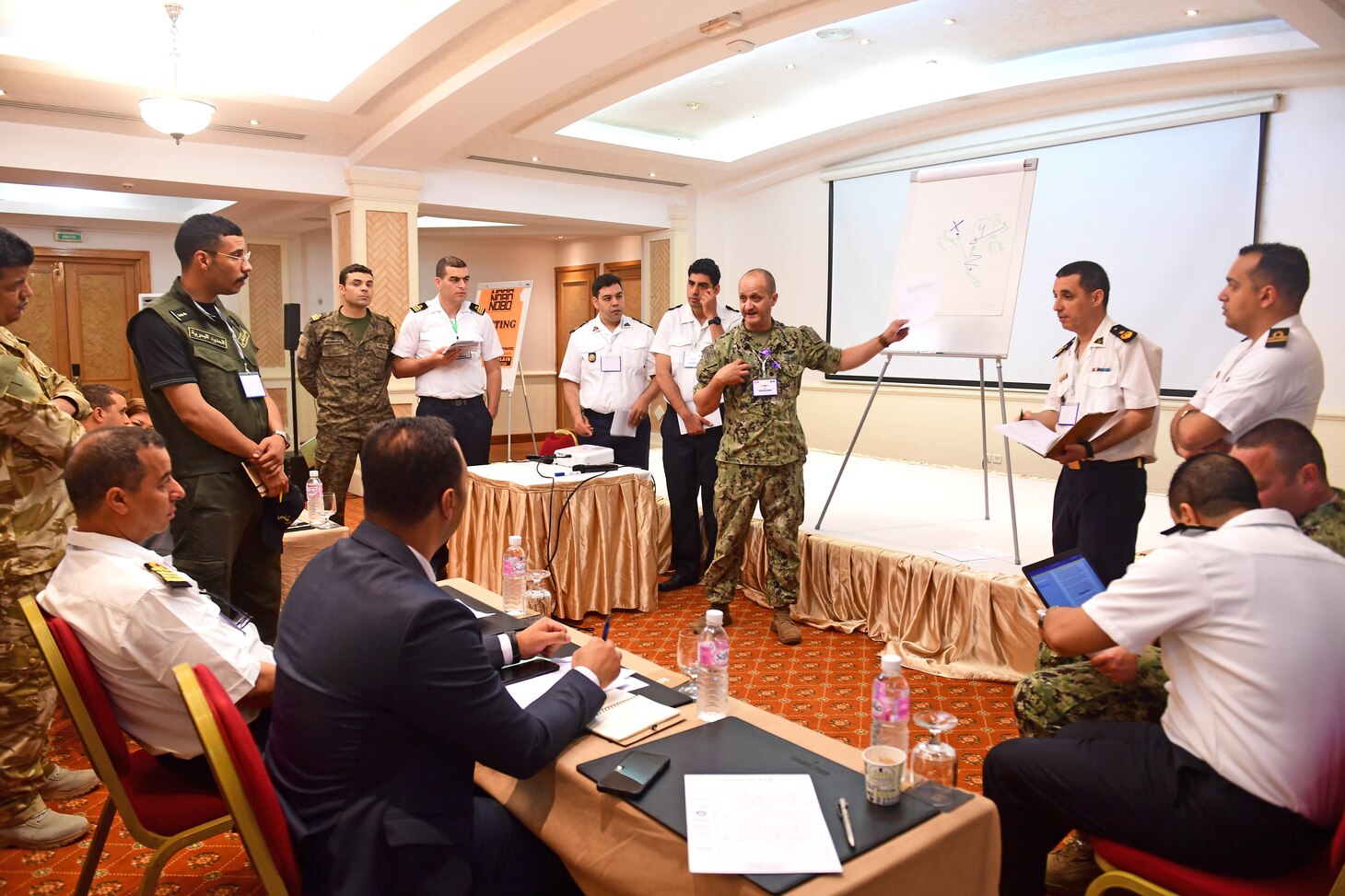 U.S. Navy and military members from Algeria, Tunisia, and Mauritania, participate in a maritime legal information exchange where best practices for maritime interdiction operations were shared during exercise Phoenix Express 2022 in Tunis, Tunisia, May 26, 2022. Phoenix Express 22, conducted by U.S. Naval Forces Africa, is a maritime exercise designed to improve cooperation among participating nations in order to increase maritime safety and security in the Mediterranean.