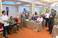 Cmdr. Jason Looper, Naval Reserve U.S. Naval Forces Europe-Africa N5 North Africa Training & Operations Director, facilitates a maritime legal information exchange to share best practices for maritime interdiction operations during exercise Phoenix Express 2022 in Tunis, Tunisia, May 26, 2022. Phoenix Express 22, conducted by U.S. Naval Forces Africa, is a maritime exercise designed to improve cooperation among participating nations in order to increase maritime safety and security in the Mediterranean.