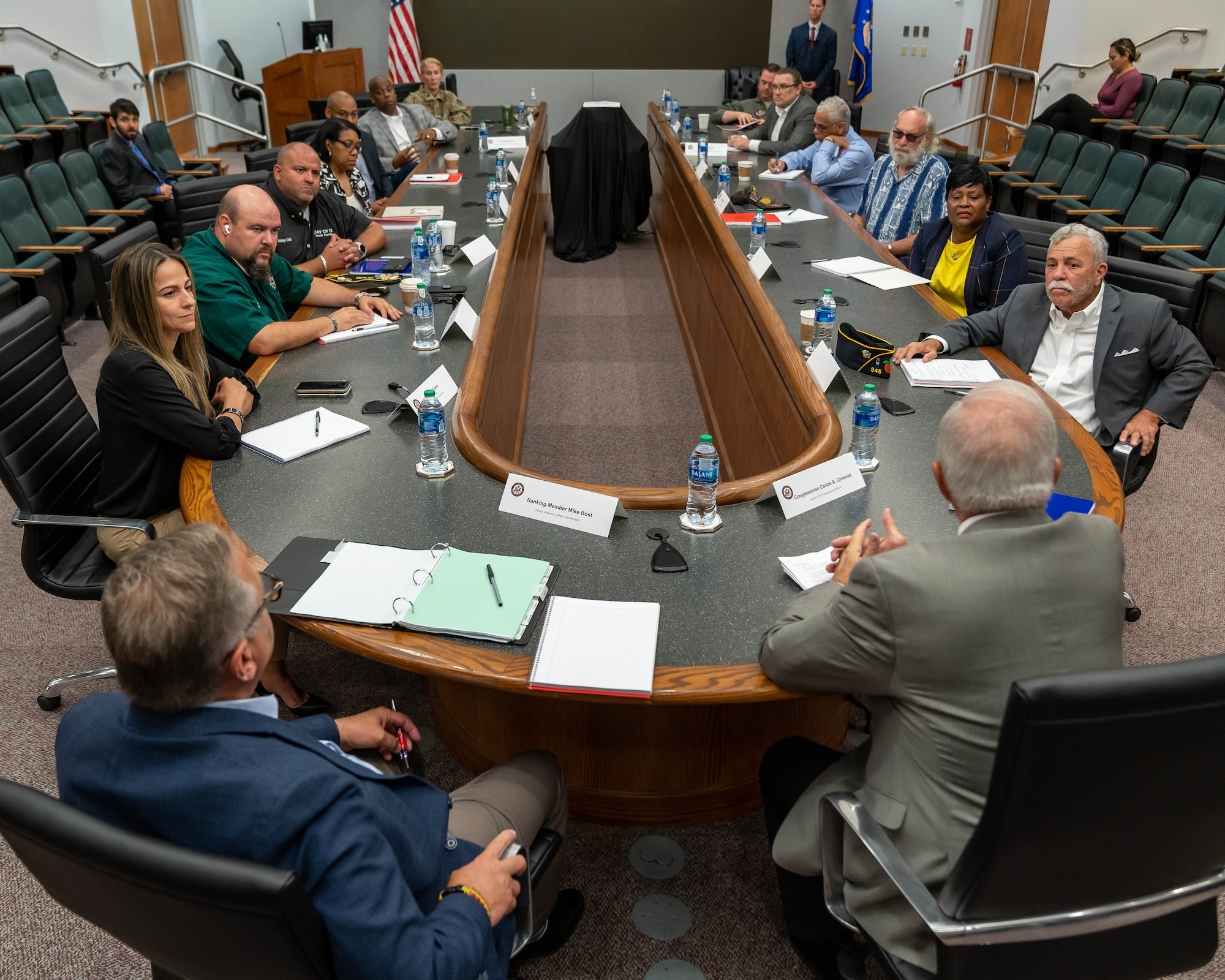 Ranking Member of the House Committee on Veterans Affairs, Rep. Mike Bost, of Illinois, left, and Rep. Carlos Gimenez of Florida at Homestead Air Reserve Base, Fla., conduct a roundtable discussion with representatives from South Florida veteran affairs organizations on June 1, 2022.(U.S. Air Force photo by Tech. Sgt. Leo Castellano)