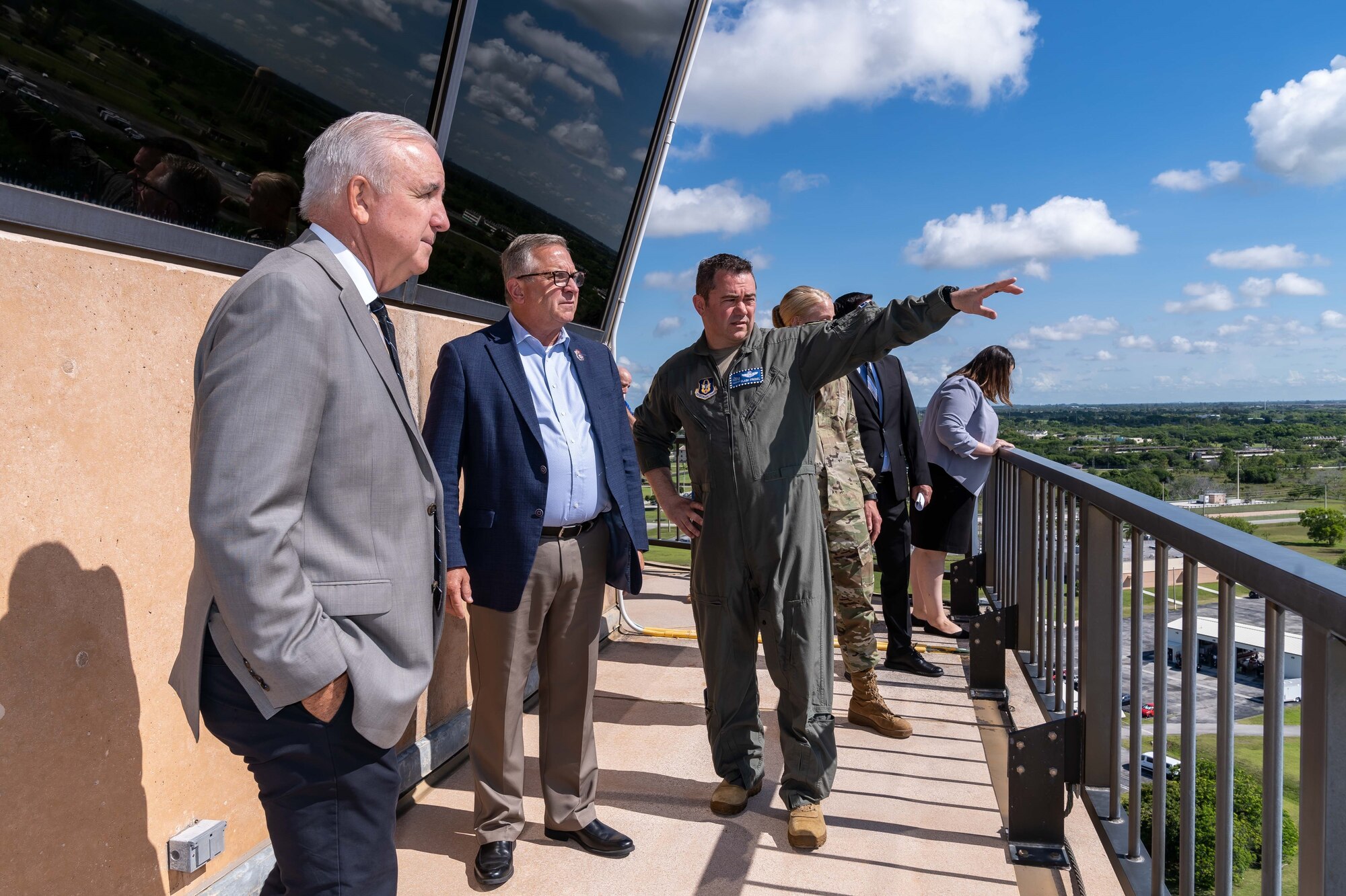 Col. S. James Frickel, 482nd Fighter Wing vice commander, speaks to Ranking Member of the House Committee on Veterans Affairs, Rep. Mike Bost, of Illinois and Rep. Carlos Gimenez of Florida during a base tour at Homestead Air Reserve Base, Fla., on June 1, 2022. (U.S. Air Force photo by Tech Sgt. Leo Castellano)