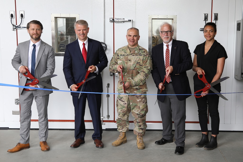 Justin Troiano, from the office of U.S. Senator Maggie Hassan of New Hampshire; Dr. David
Pittman, U.S. Army Engineer Research and Development Center (ERDC) director and director of
R&D for the U.S. Army Corps of Engineers (USACE); Col. John Atilano II, USACE New England
District commander; Dr. Joseph Corriveau, director of ERDC’s Cold Regions Research and
Engineering Laboratory (CRREL); and Milla Anderson, from the office of U.S. Represenative Ann
Kuster cut the ribbon to CRREL’s new Climatic Cold Chamber Building in Hanover, New
Hampshire, June 2, 2022. The chamber can maintain a temperature of minus 54 degrees Celsius
and can hold a running vehicle. This newest one-of-a-kind technology for ERDC will be utilized
for testing equipment used by the warfighter in extreme cold regions.