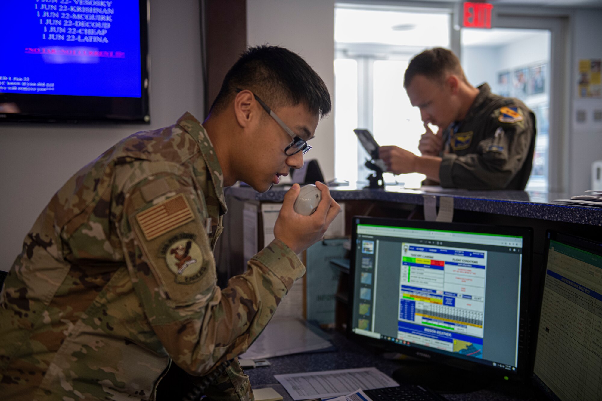 Airman Ryurei-Alexie Bautista, 334th Fighter Generation Squadron aviation

resource manager, communicates through radio to inbound F-15E Strike Eagle

pilots' at Seymour Johnson Air Force Base, North Carolina, June 2, 2022. The

334th FGS stands ready to deploy and conduct combat operations anytime and

anywhere. (U.S. Air Force photo by Airman 1st Class Sabrina Fuller)