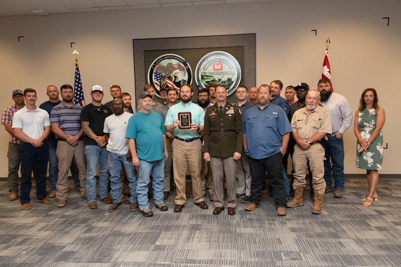 The Thatcher Lock and Dam Team, which consisted of Engineering and Construction Division and Public Affairs Office team members, were recognized for their collaboration and cooperation to achieve the mission. In November 2021, Thatcher L&D experienced a leak in a hinged crest gate which required quick action by all team members to repair the issue and keep stakeholders and the public informed.