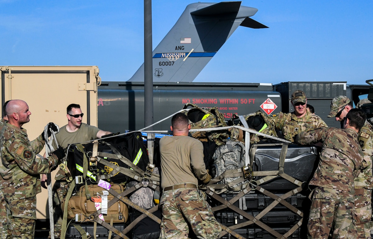 Airmen from the 156th Contingency Response Group, 172nd Contingency Response Flight and 146th Contingency Response Flight prepare a pallet for upload at the Combat Readiness Training Center, Gulfport, Mississippi, April 21st. Southern Strike 2022 is an excellent test of our joint team’s ability to conduct major campaign, crisis response and security cooperation operations. (U.S. Air National Guard photo by 1st Lt. Kiara N. Spann)
