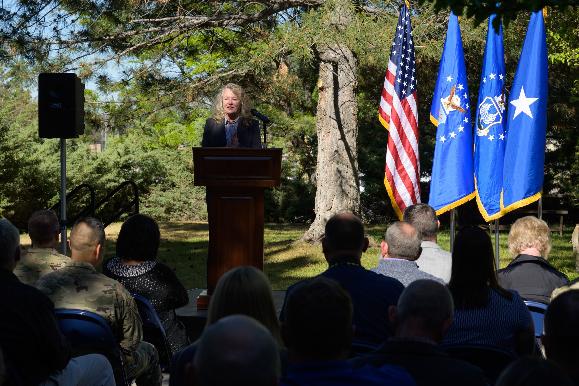 Sandy Fitzgerald speaks during an appointment to leadership ceremony at Hill Air Force Base, Utah, June 2, 2022. Fitzgerald was appointed director of the 309th Commodities Maintenance Group during the ceremony. The 309th CMXG is the technical repair center for landing gear, wheels, brakes, secondary power systems, hydraulics and composites. (U.S. Air Force photo by R. Nial Bradshaw)