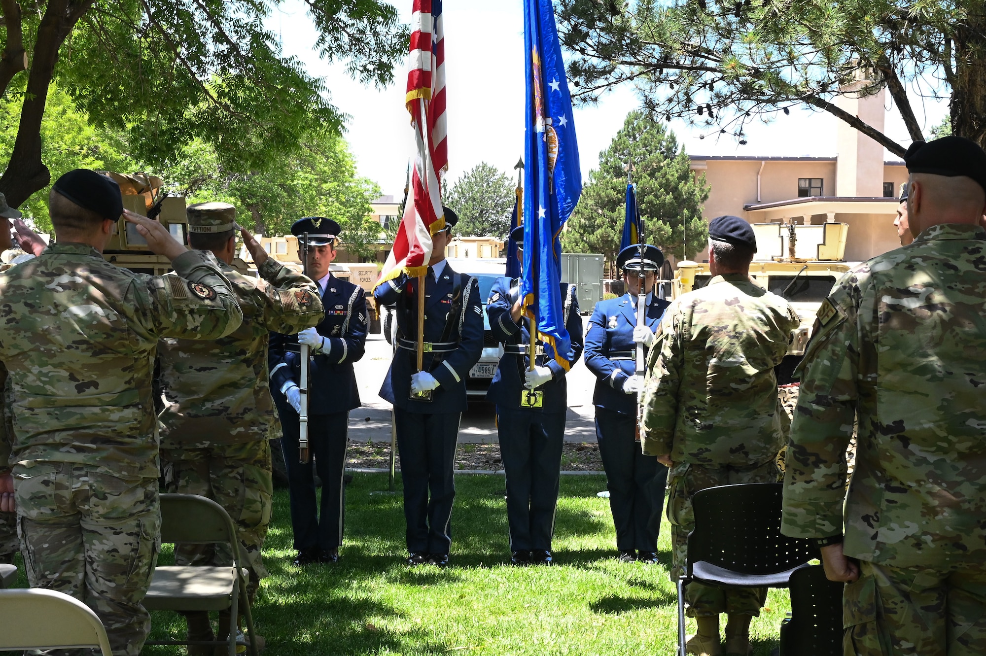 The Honor Guard presents the colors at a ceremony..