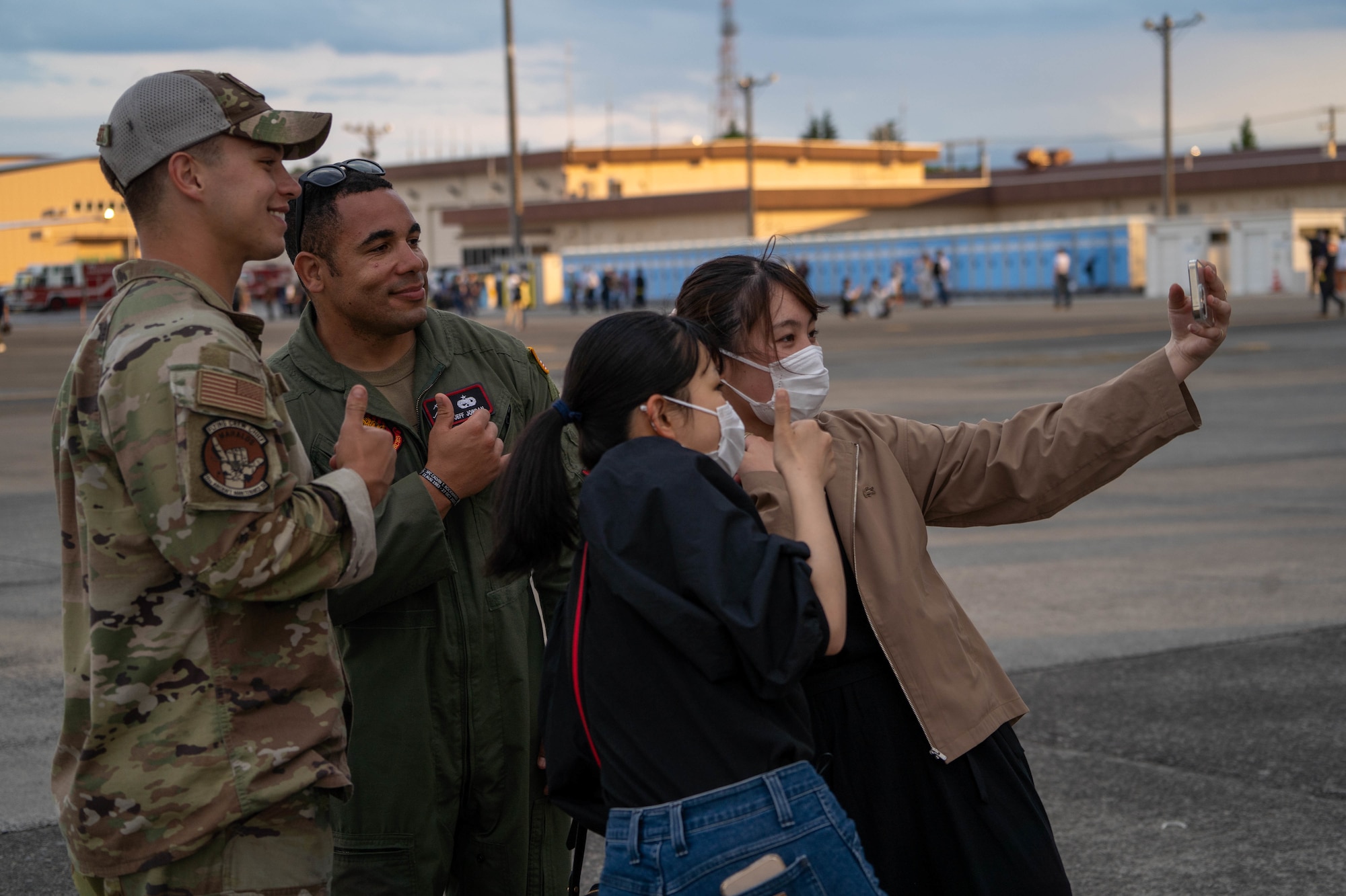 Airmen assigned to the 15th Wing interact with festival guests during the Friendship Festival 2022 at Yokota Air Base, Japan, May 22, 2022. The festival embodied the true spirit of friendship, welcoming more than 110,000 Japanese neighbors to meet with our Airmen and tour static displays of U.S and Japanese Aircraft while sharing our cultures and stories. (U.S. Air Force photo by Airman 1st Class Makensie Cooper)