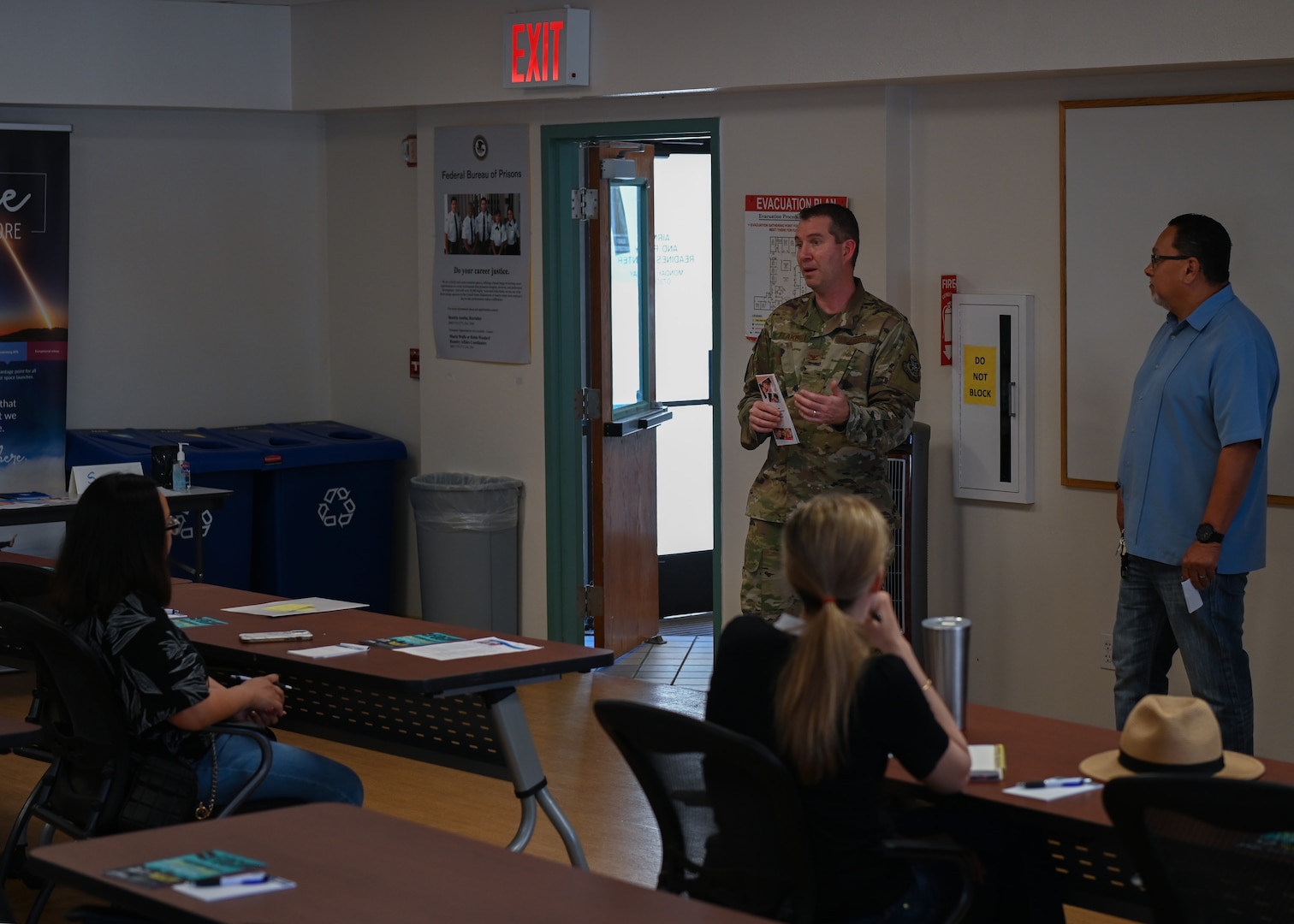 Col. Eric M. Flake, Joint Base Lewis-McChord medical director, greets and welcomes parents during the developmental pediatrics workshop at Vandenberg Space Force Base, Calif., May 25, 2022. Flake explained how the Air Force Developmental Behavioral Family Readiness Center collaborates with families that have children with special needs to provide assistance with programs that cater to their specific developmental and behavioral needs. (U.S. Space Force photo by Airman 1st Class Tiarra Sibley)