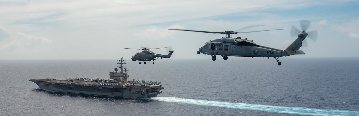 220602-N-LI114-1207 PHILIPPINE SEA (June 2, 2022) A Republic of Korea (ROK) Navy Lynx helicopter, assigned to the ROK Navy landing platform-helicopter ROKS Marado (LPH 6112), and an MH-60S Seahawk, attached to the Golden Falcons of Helicopter Sea Combat Squadron (HSC) 12, fly in formation near the U.S. Navy’s only forward-deployed aircraft carrier USS Ronald Reagan (CVN 76) during Carrier Strike Group Exercise 2022. Carrier Strike Group Exercise is a bilateral exercise between the U.S. Navy and Republic of Korea Navy. This exercise allows our navies to refine operations and engagement to strengthen future cooperation while supporting the alliance that remains vital to the security interests of both nations and to stability in Northeast Asia. (U.S. Navy photo by Mass Communication Specialist 2nd Class Michael B. Jarmiolowski)
