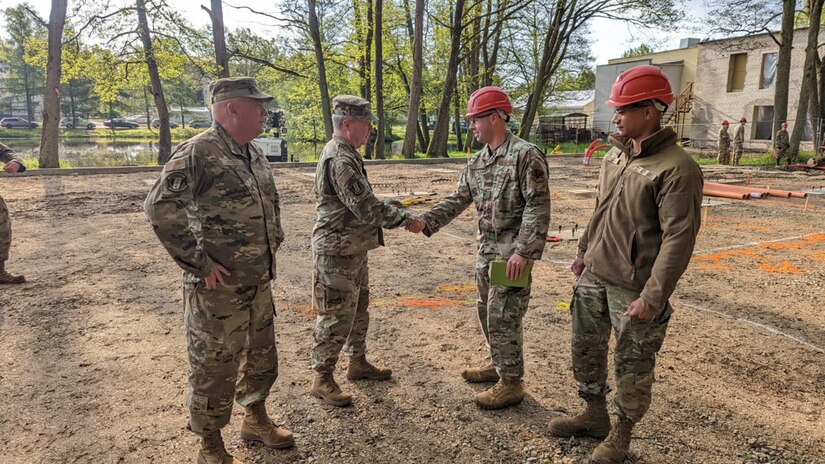 Brig. Gen. Michael Regan Jr., deputy adjutant general-Air, Pennsylvania National Guard, and other Pa. Air National Guard senior leaders met with 201st RED HORSE units from the 111th Attack Wing and 193rd Special Operations Wing in Klaipeda, Lithuania, on May 26, 2022. They received a tour of a pre-engineered building site and received a briefing of the project’s status.
