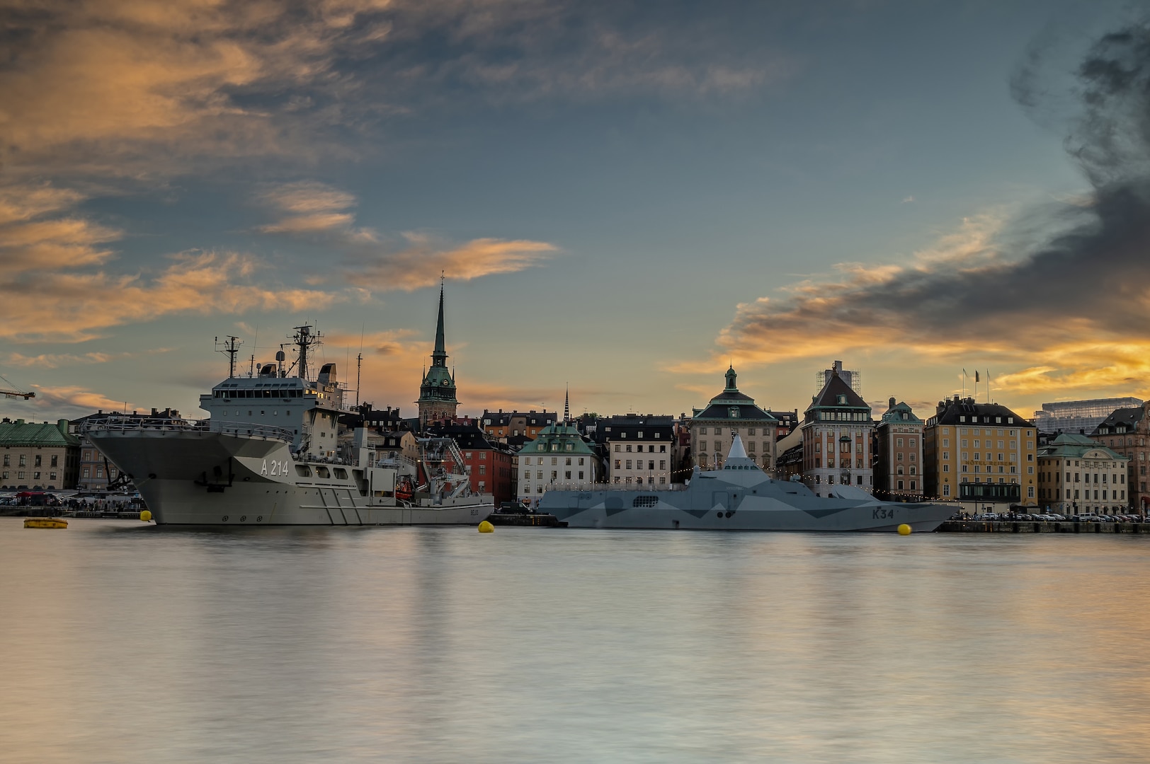 Swedish submarine rescue ship HSwMS  Belos (A214) and Visby-class corvette HSwMS Nyköping (K34) are moored in Stockholm prior to getting underway for exercise BAPTOPS22.