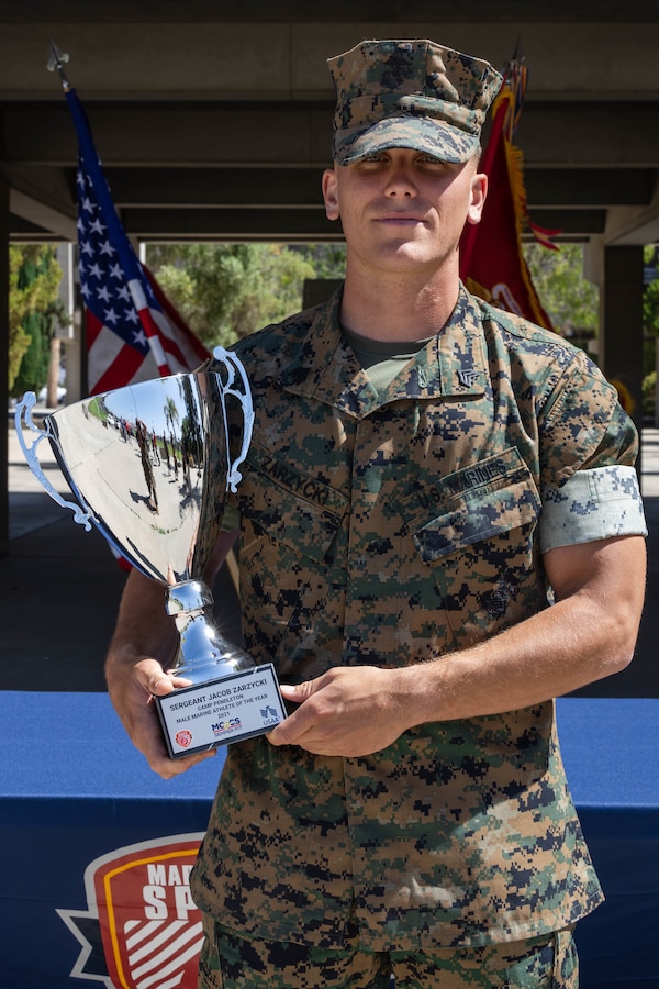 U.S. Marine Sgt. Jacob Zarzycki, the heavy equipment chief with Combat Logistics Battalion 13, Combat Logistics Regiment 17, 1st Marine Logistics Group, poses for a photo following the Camp Pendleton Male Marine Athlete of the Year award ceremony on Marine Corps Base Camp Pendleton, California, May 31, 2022. Zarzycki participated in the Ironman 70.3 World Championship and a 32.5-mile ultramarathon, and has completed smaller races, such as half marathons and various triathlons. Zarzycki is a native of Clinton Township, Michigan.